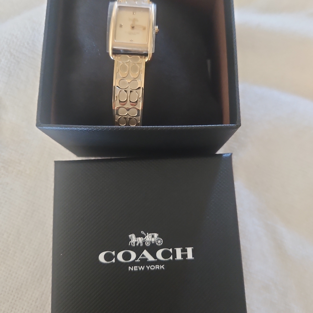 Coach Women's Gold-Tone Signature C Bracelet Watch